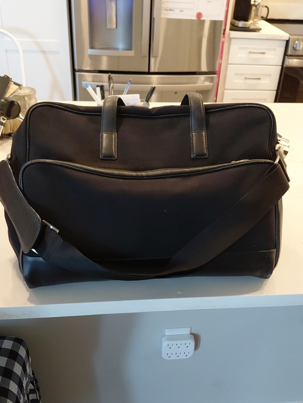 Tumi Black Men's Duffel Bag with Shoulder Strap